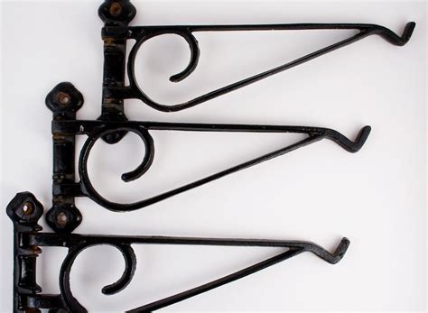 hanging plant hook hanger black swivel bracket metal|black iron plant hangers.